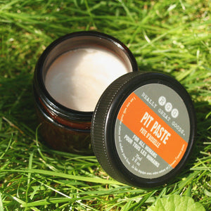 Open jar of Pit Paste in grass by Really Great Goods