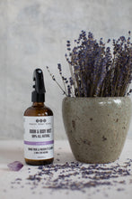 Lav Lime Room & Body Mist with pot of dried lavender branches and lavender flowers scattered around