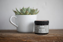 pit paste with succulent plant in mug on wooden surface, pit paste by Really Great Goods