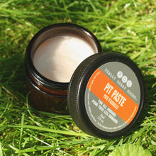Open jar of Pit Paste in grass by Really Great Goods