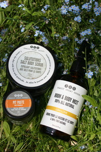 pit paste, salt body scrub and lem love room & body spray by Really Great Goods in grass with small flowers