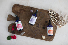 Lavender, Rose and Neroli Organic Face Mists on wooden cutting board, from Really Great Goods