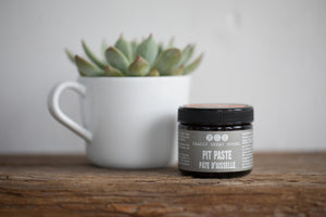 pit paste by Really Great Goods on wood with succulent in white mug
